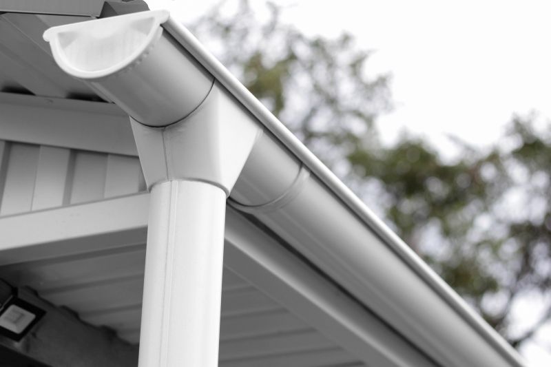 Gutter system with leaf guard
